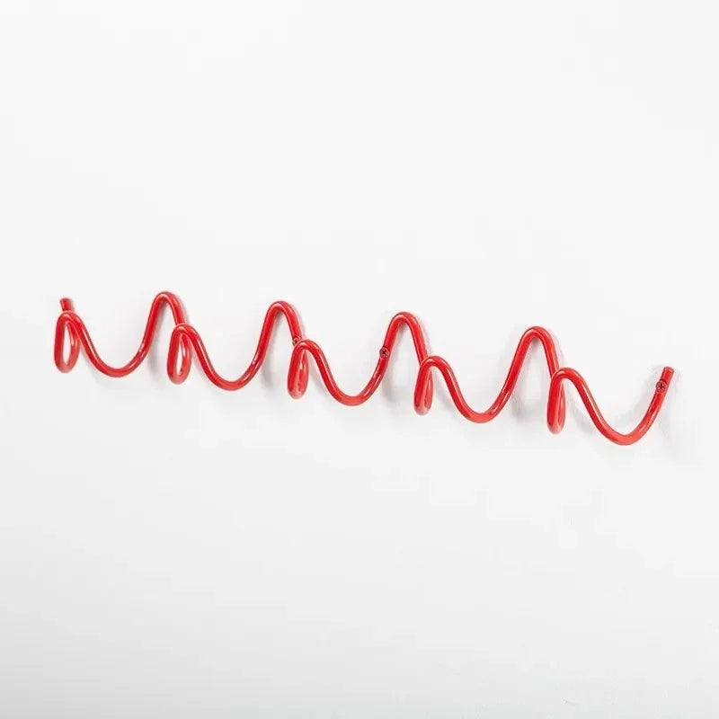 Space-saving wall hanger with multiple hooks wave