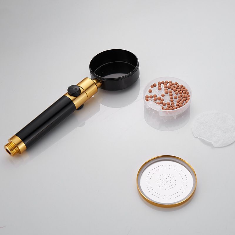Round handheld shower head with adjustable water flow