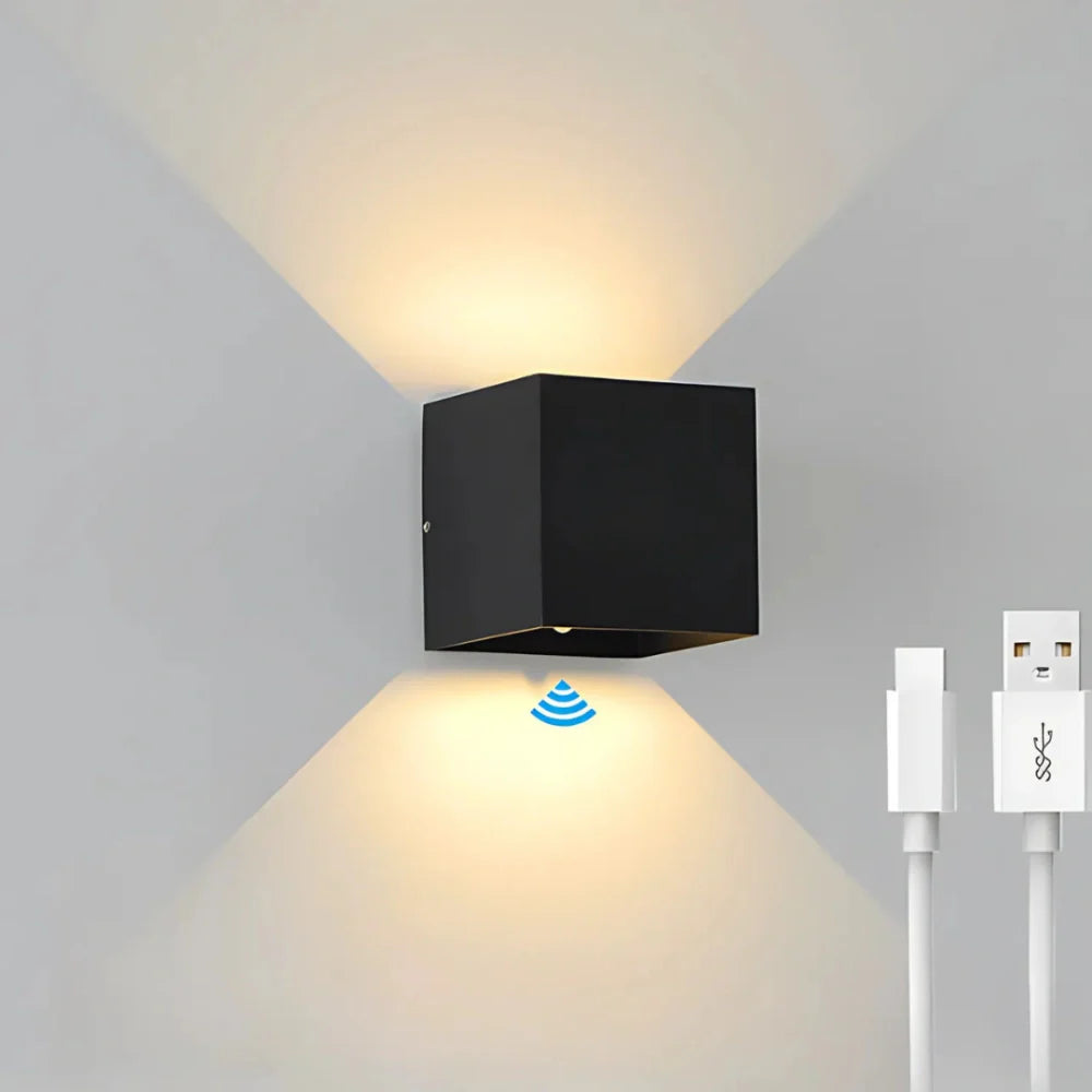 Modern cube-shaped wall sconce with adjustable light angle