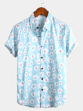 Camicia da vacanza da uomo blu con motivo floreale e bottoni