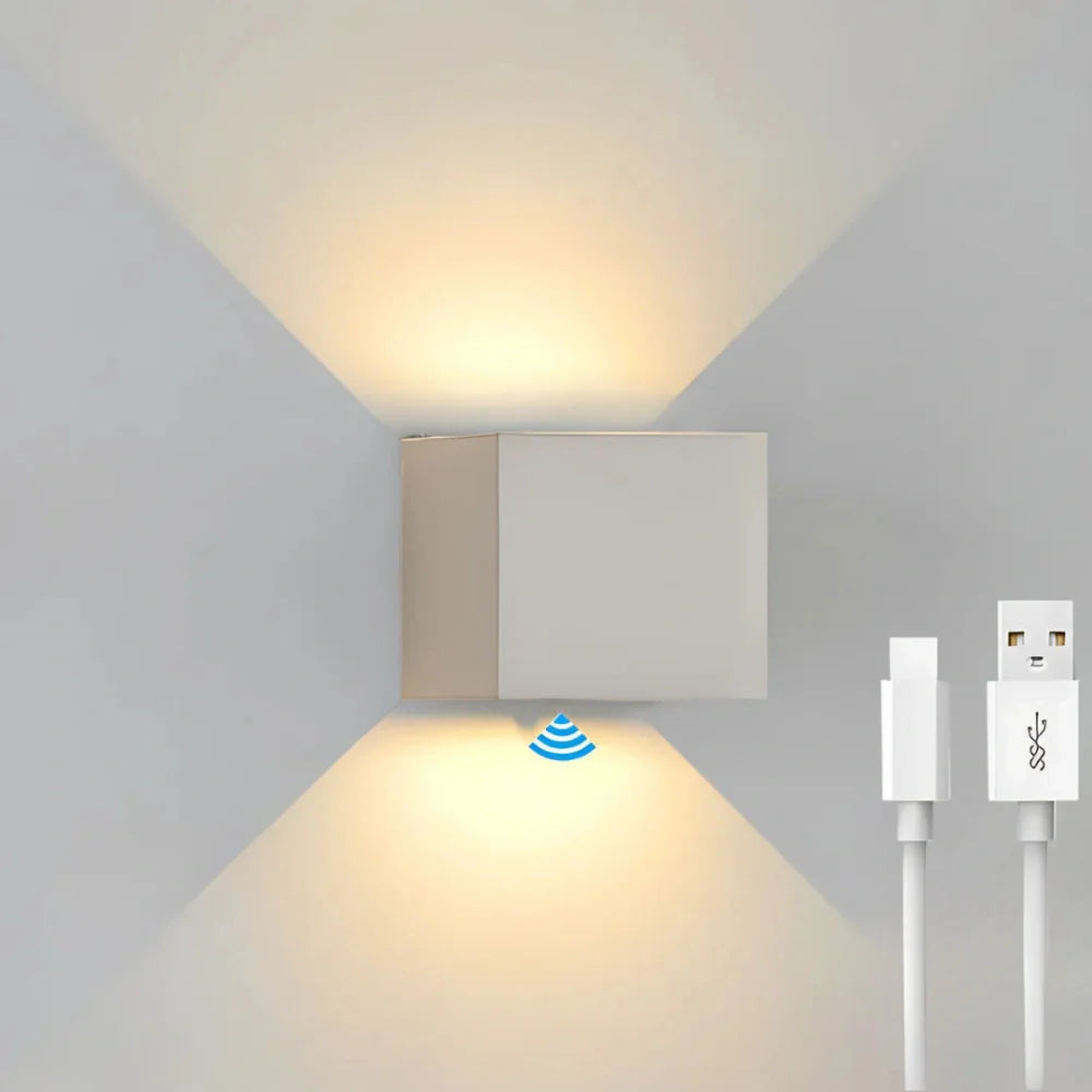 Modern cube-shaped wall sconce with adjustable light angle