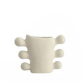 Decorative, sculpted vase – modern table decoration