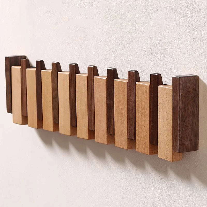 Appendiabiti da parete in legno versatile con ganci pieghevoli – stile pianoforte
