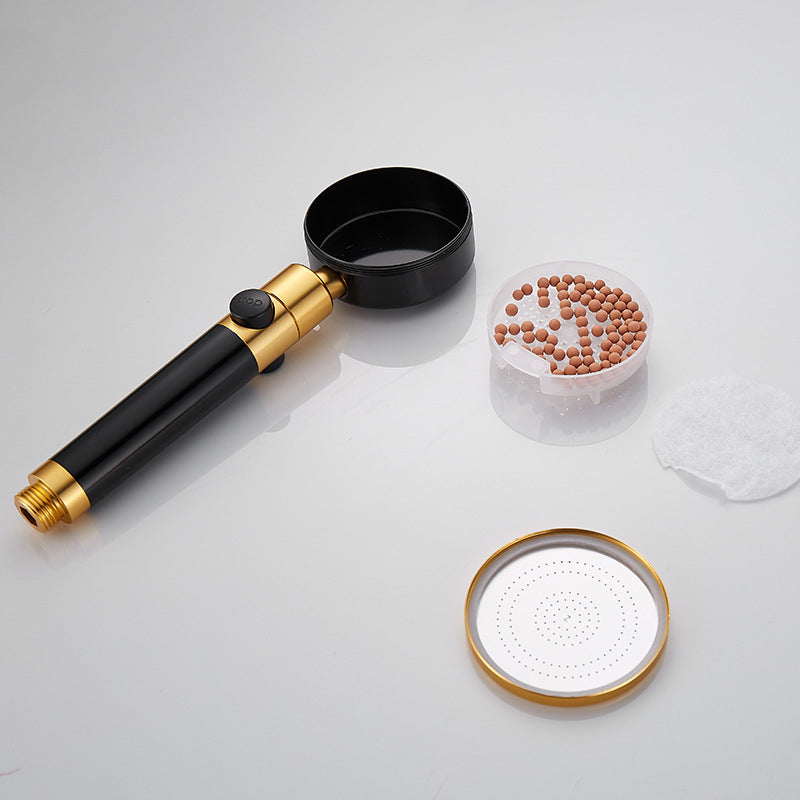 Round handheld shower head with adjustable water flow