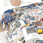 Artystyczny koc w stylu boho z motywem kwiatowym