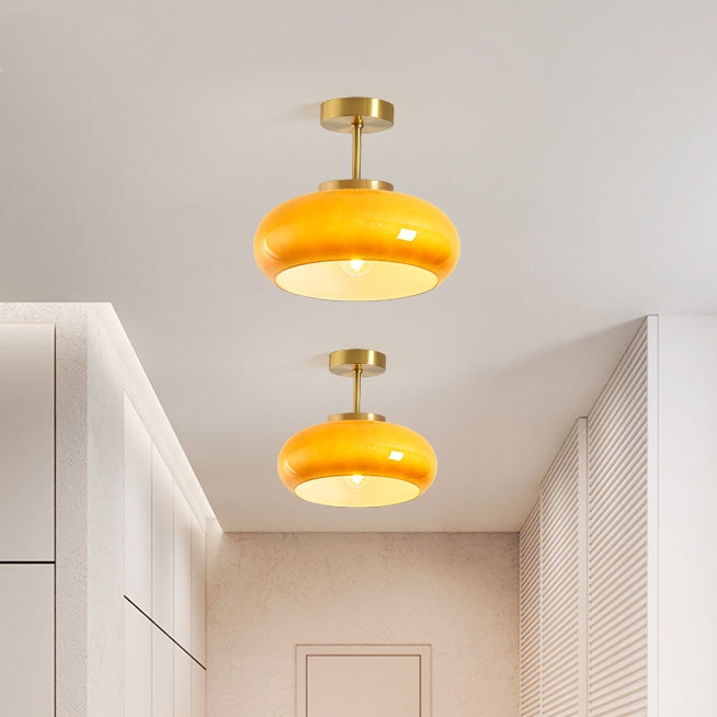 Klassische runde Deckenlampe aus bernsteinfarbenem Glas