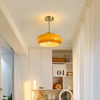 Klassische runde Deckenlampe aus bernsteinfarbenem Glas