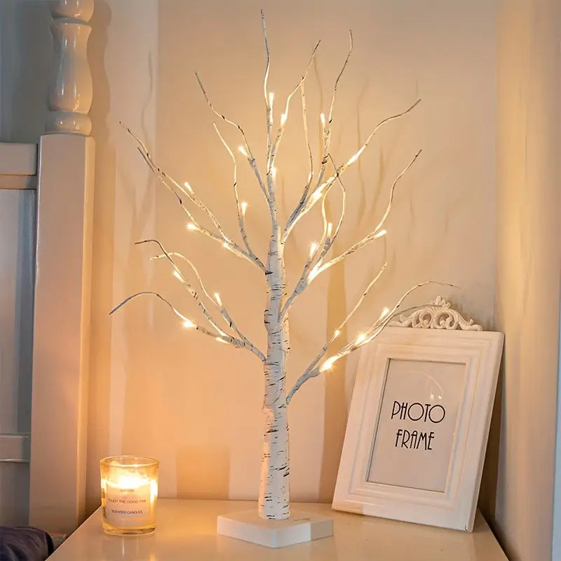 Set of decorative LED table lamps shaped like birch trees with warm light