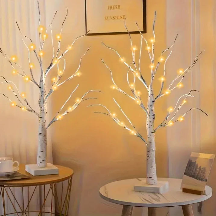 Set of decorative LED table lamps shaped like birch trees with warm light