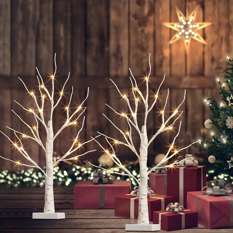 Set of decorative LED table lamps shaped like birch trees with warm light