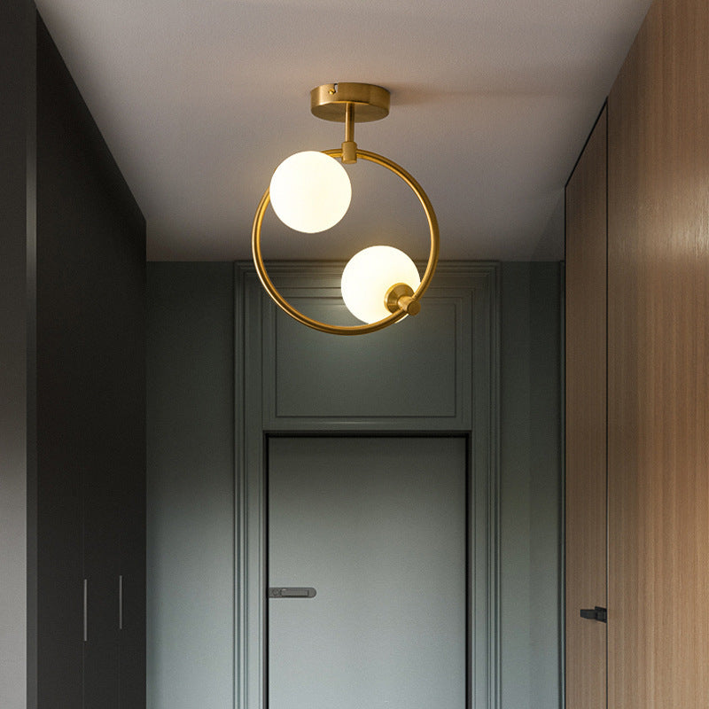 Cozy Scandinavian glass ceiling lamp in curved globe shape