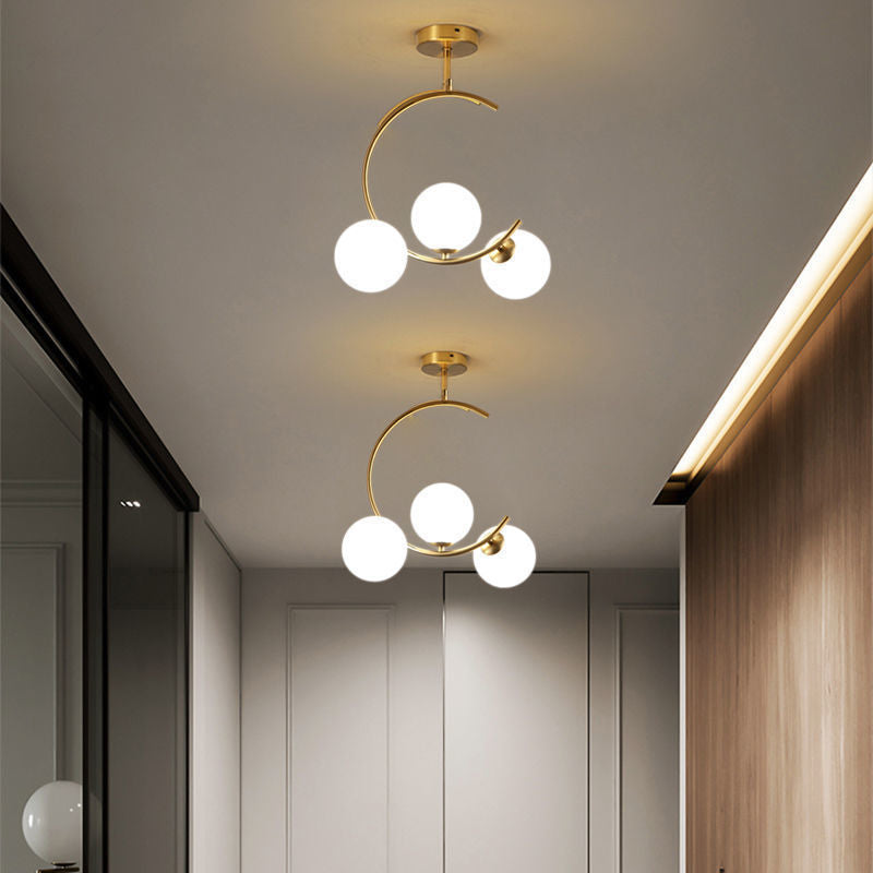 Cozy Scandinavian glass ceiling lamp in curved globe shape