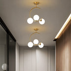 Cozy Scandinavian glass ceiling lamp in curved globe shape