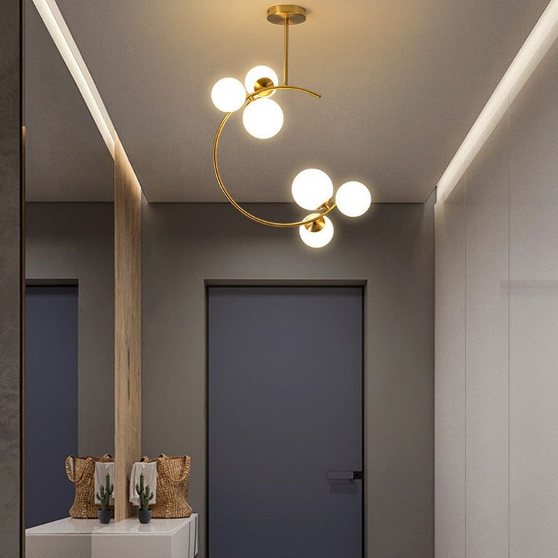 Cozy Scandinavian glass ceiling lamp in curved globe shape