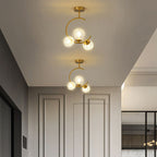 Cozy Scandinavian glass ceiling lamp in curved globe shape