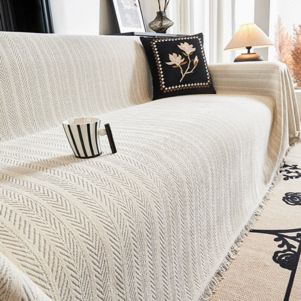 Herringbone sofa throw with fringes for the living room