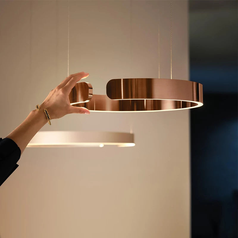 Atmospheric round luminous LED pendant lamp for living rooms
