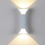 Modern outdoor LED wall light with curved design directing light up and down