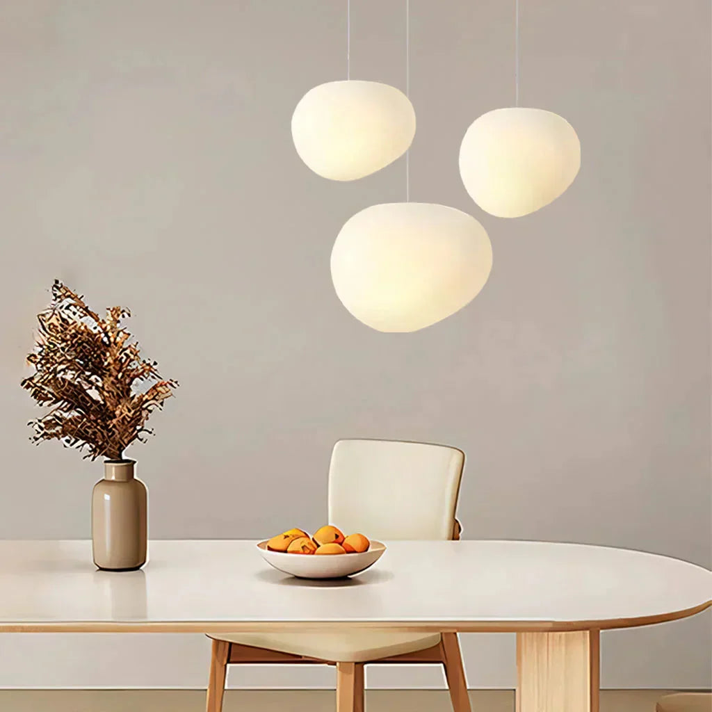 Artistic pendant lamp with frosted glass and pebbles for dining rooms and living rooms