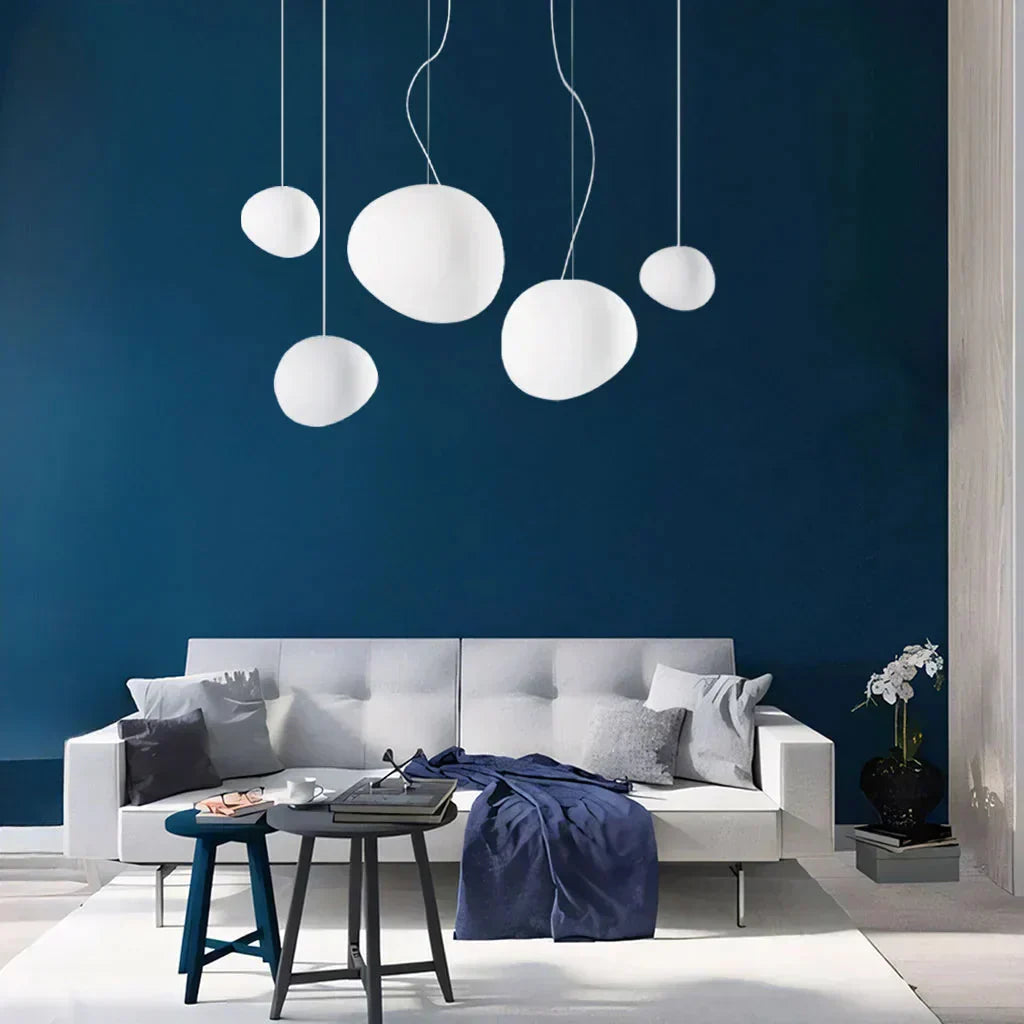 Artistic pendant lamp with frosted glass and pebbles for dining rooms and living rooms