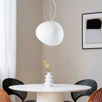 Artistic pendant lamp with frosted glass and pebbles for dining rooms and living rooms