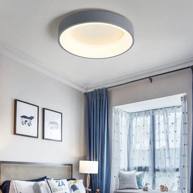 Minimalist atmospheric warm elegance of a round Nordic LED ceiling lamp