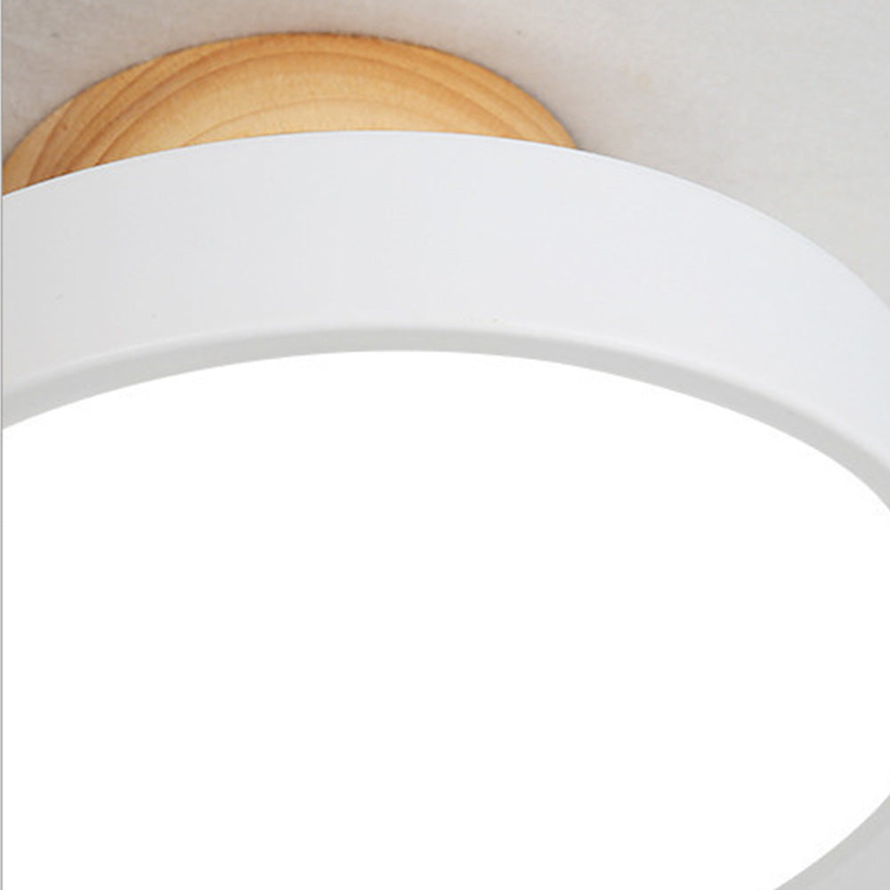 Warm Scandinavian round wooden LED ceiling lamp for modern interiors