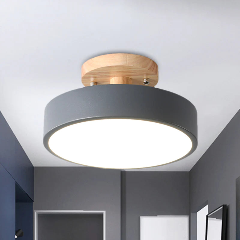 Warm Scandinavian round wooden LED ceiling lamp for modern interiors