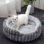 Beruhigendes Donut-Bett mit erhöhten Seiten für Hunde und Katzen
