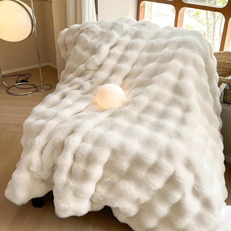 Vielseitige kuschelige Kunstfell-Decke für jede Jahreszeit