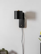 Lampada da parete cilindrica regolabile e girevole