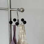 Nowoczesny obrotowy drewniany wieszak