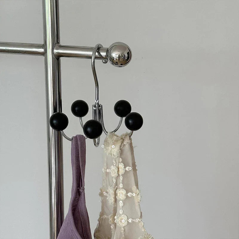 Nowoczesny obrotowy drewniany wieszak