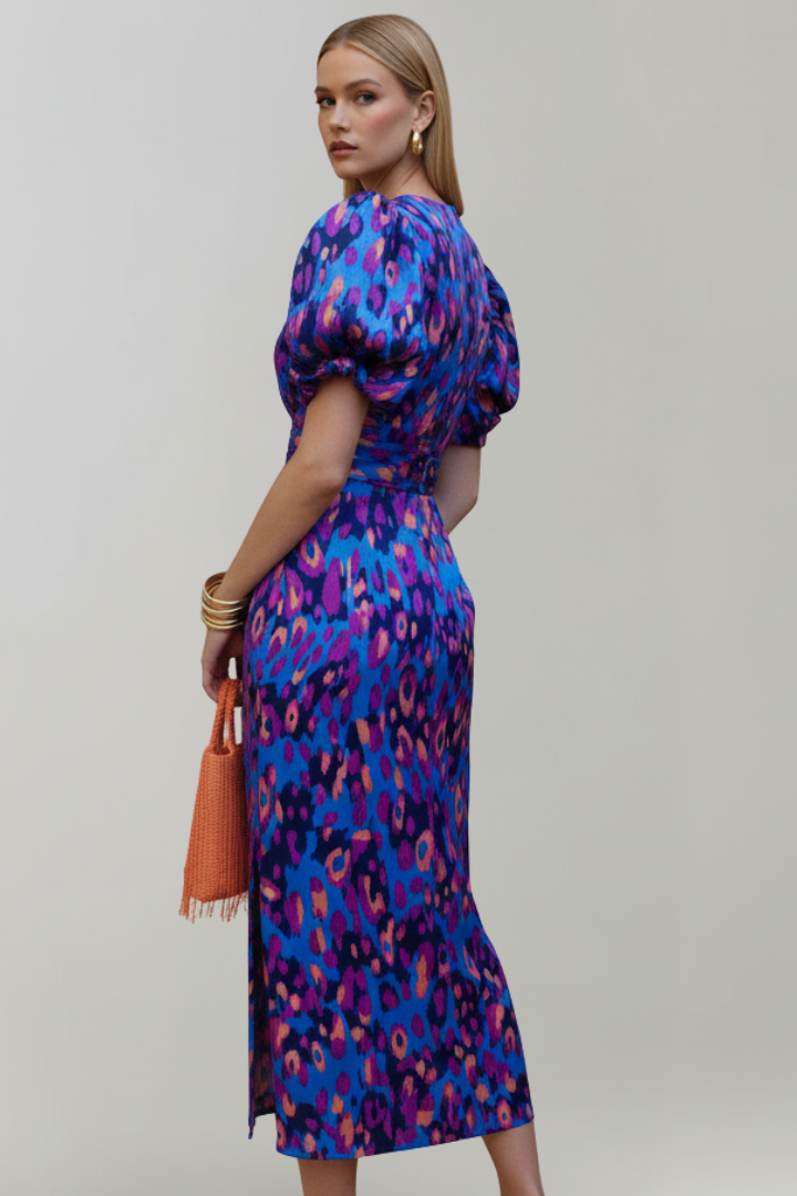 Women's airy midi dress with V-neckline, puff sleeves, and ruched waist, patterned