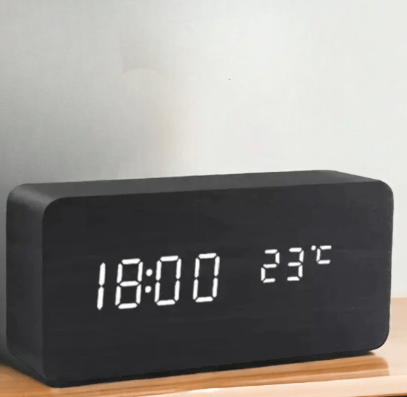 Minimalist wooden LED clock with sound activation for modern homes