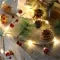 Battery Operated Christmas Garland Lights with LED Pine Cones and Copper Wire - Image 1