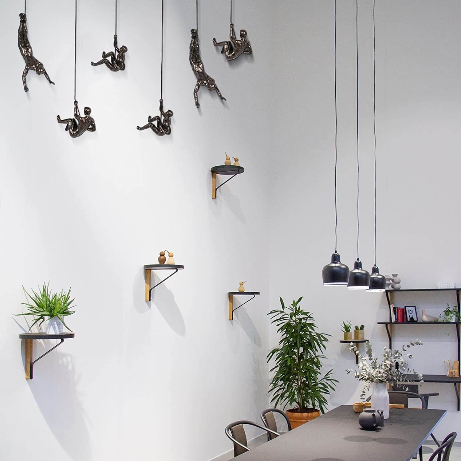 Artystyczna sztuka ścienna z motywem wspinacza do wystroju domu