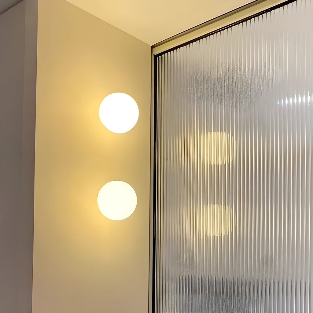 Flush Mount Globe Wall Sconce with Frosted Glass and Modern Minimalist Design - Image 4