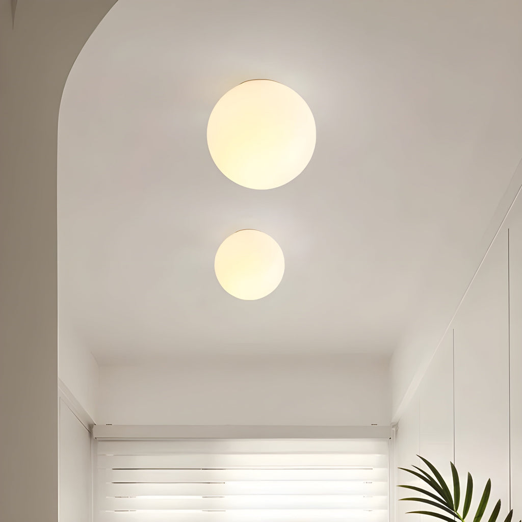 Flush Mount Globe Wall Sconce with Frosted Glass and Modern Minimalist Design - Image 5