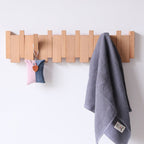 Porte-manteau mural en bois avec crochets pliants style piano