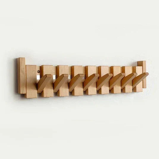 Space-saving wall hanger – practical retractable hooks