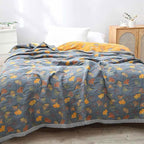 Coperta reversibile accogliente con motivo foglie naturali