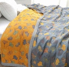 Coperta reversibile accogliente con motivo foglie naturali