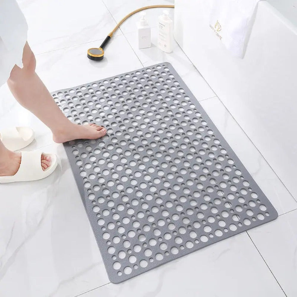Non-slip shower mat with a safe surface