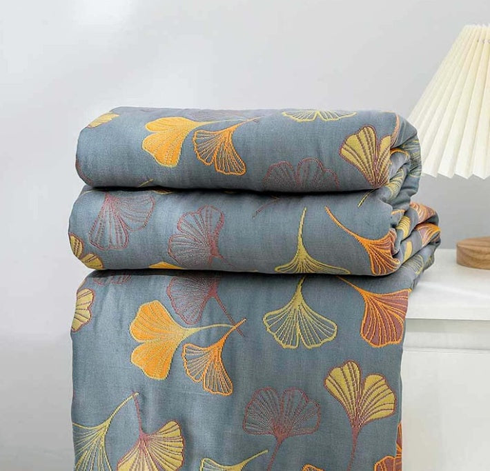 Coperta reversibile accogliente con motivo foglie naturali