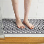 Non-slip shower mat with a safe surface