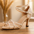 Ballroom dance shoes with a stable heel and shiny design