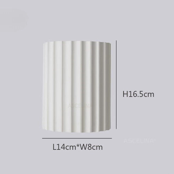 Elegancka okrągła lampa ścienna w delikatnych kolorach