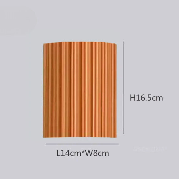 Elegancka okrągła lampa ścienna w delikatnych kolorach