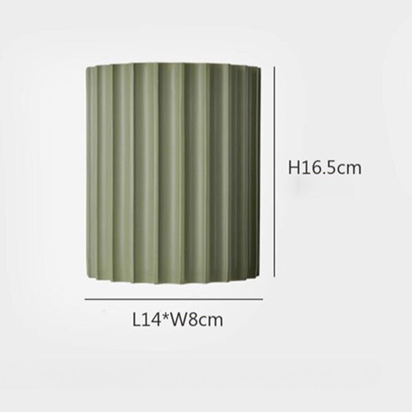 Elegancka okrągła lampa ścienna w delikatnych kolorach